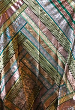 Could be a wall hanging or a bed cover