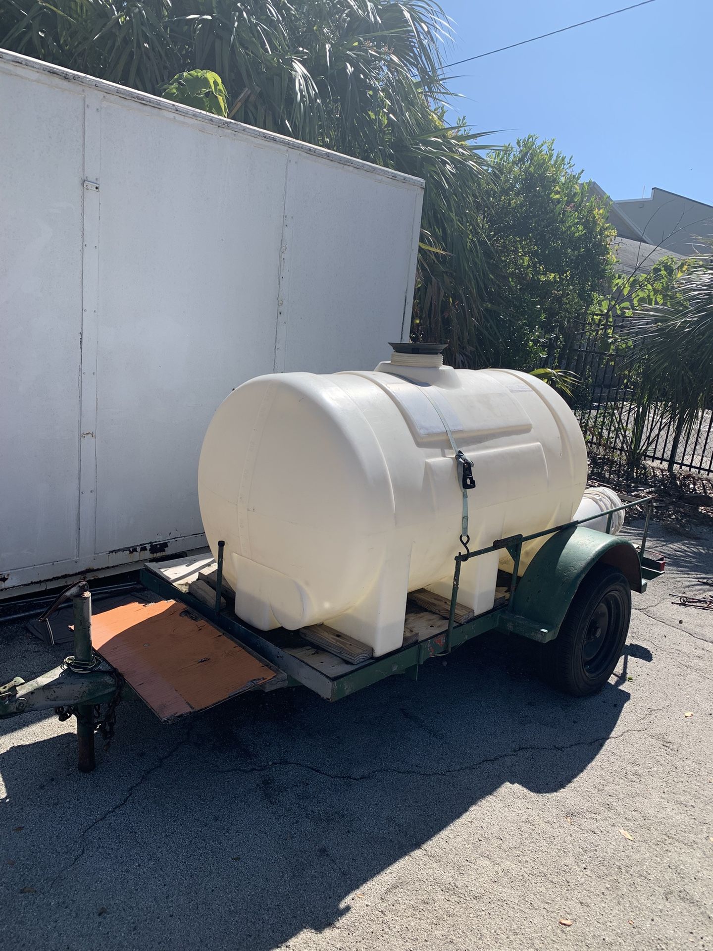Pressure Cleaning Trailer With Pressure Washer Mounted On It.