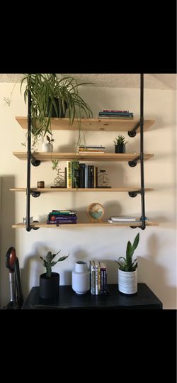 Freestanding industrial pipe shelf