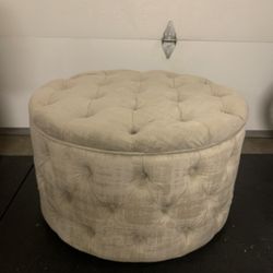 Grey tufted ottoman