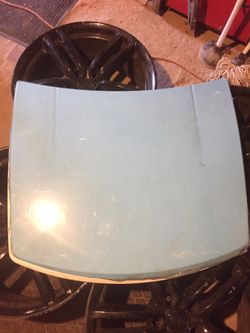 Two metal display hoods one blue and one white