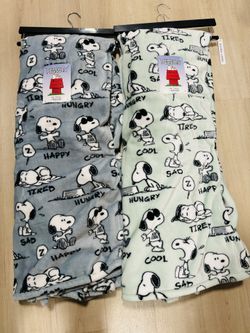 2 Peanuts Snoopy throws