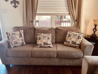 2 BEAUTIFUL ASHLEY FULL SIZE SOFAS  240.00 we each