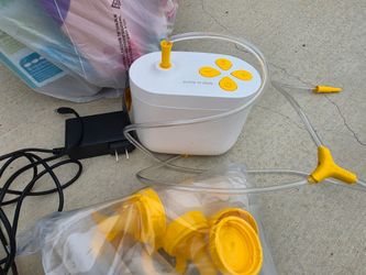 Medela pump in style - 1.5 years old. New bottles. Supplies