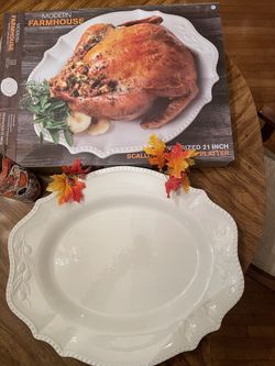 Very large scalloped turkey platter. New in box. 25.00