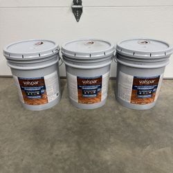 Valspar Pre-Tinted Redwood Naturaltone Transparent Exterior Wood Stain and Sealer in One ( 5-gallon ) $209 plus tax at Lowe's for 5 gallon. I have thr