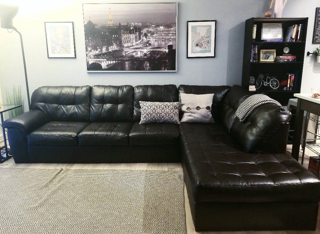 Dark brown leather couch.