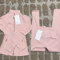 Lululemon pink set - jacket and leggings size 2-4