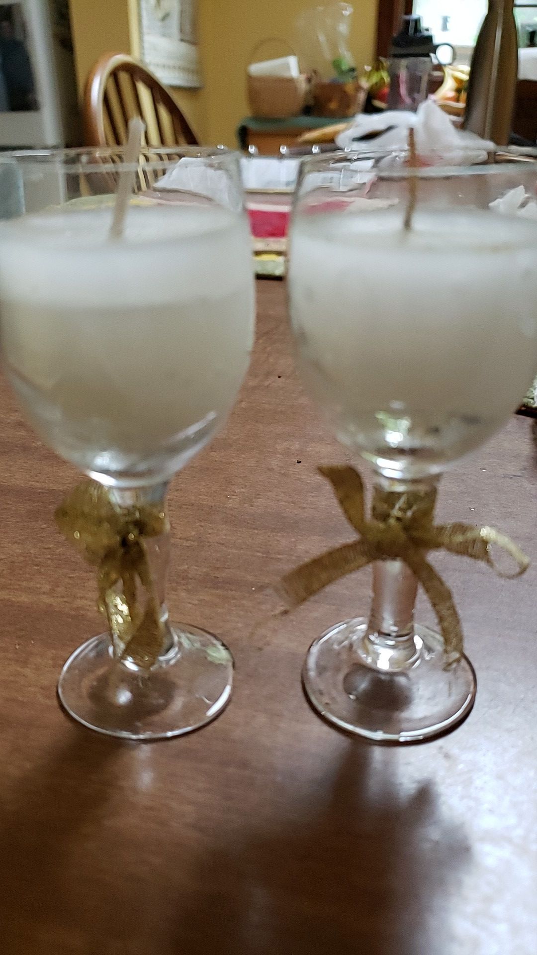 To little pretty candles in wine glasses