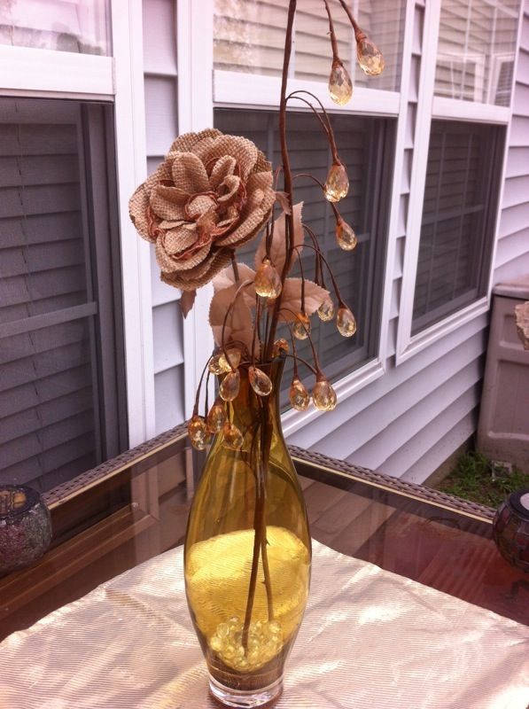 Beautiful vase filled with flower and glass beads!