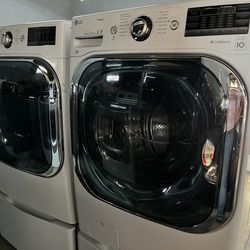 LG Washer 5.0 cu. ft. Capacity And front-load Model With 7.3 cu. ft. In White.