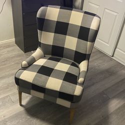 Two exact same flannel chairs