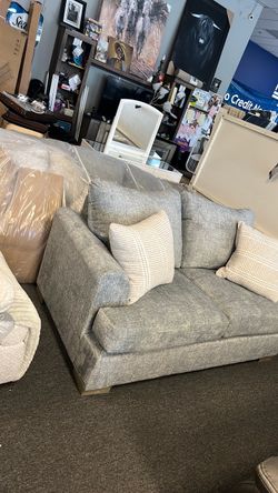 Nicest grey soft 2pc livingroom set in town was $2899 now $1500 can deliver can finance