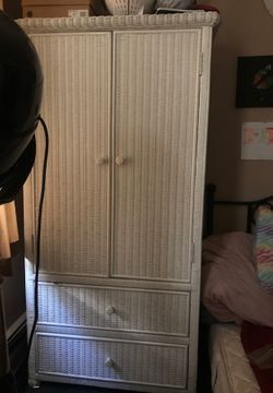 White wood like hutch spacious insides. Came as a set with the dressers but selling it separately