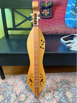 Handcrafted wooden dulcimer