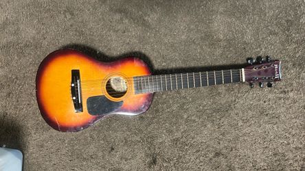 Mark II sunburst acoustic guitar 2 picks