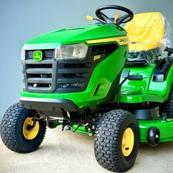 Brand New John Deere S120 42 in. 22 HP V-Twin Gas Hydrostatic Riding Lawn Mower comes with bagger system. 