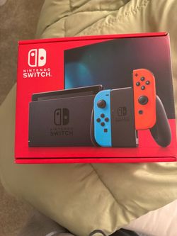 Nintendo Switch with Neon Blue and Neon Red Joy-Con