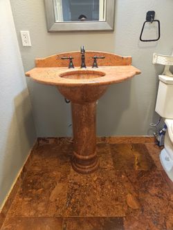 Carved Stone Pedestal Sink
