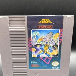 Nintendo nes mega man game
Authentic Great Condition 
Working perfectly