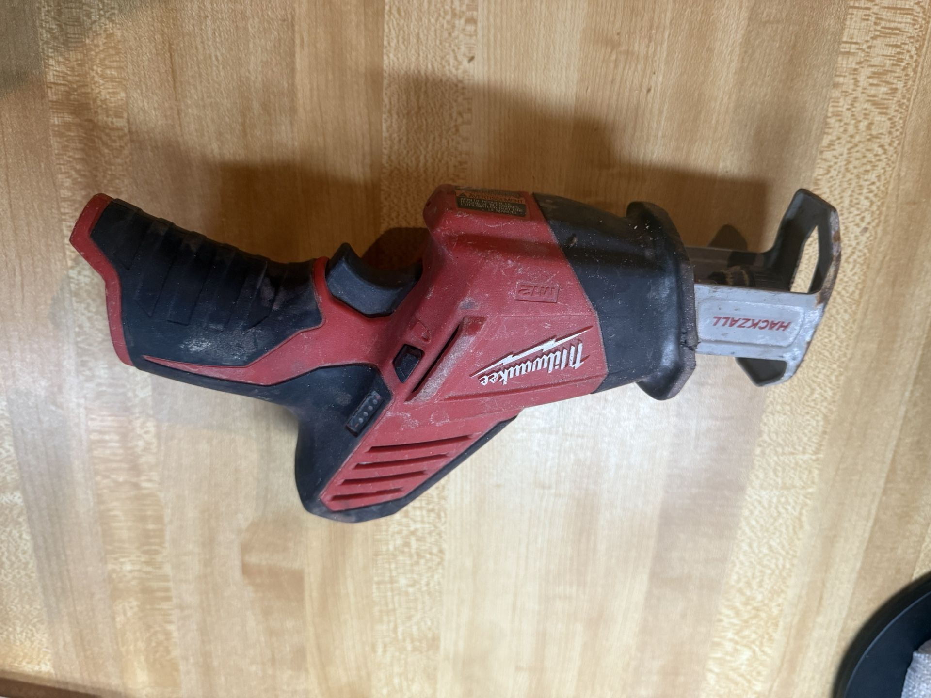 Milwaukee 12v saw all tool only used but works great $50 in n Lakeland 