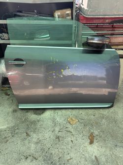 2014 volkswagen beetle convertible passenger side door. 
