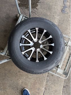 New 225-75-15inch trailer tires with 6-lug black aluminum wheels. In stock