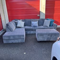 3pc Gray Sectional with a Ottoman $800