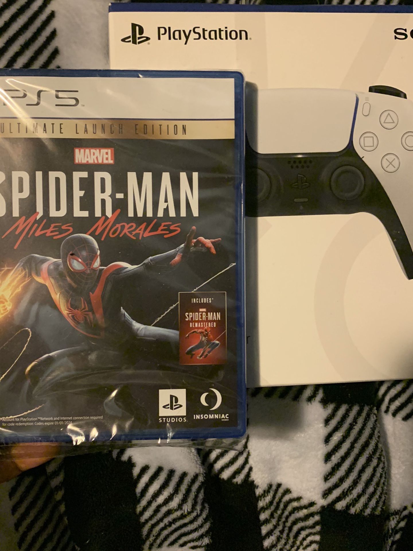 Play Station 5Spiderman Miles Morales Ultimate Edition bro With Ps5 Controller Bundle