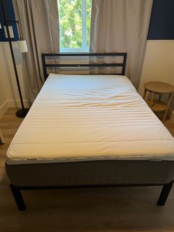 Full size bed frame, mattress, and mattress pad