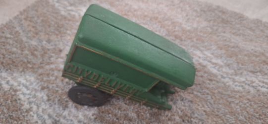 Old Antique Cast iron green with black tires city delivery wagon w/ rider two pieces