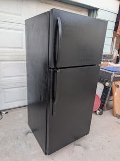 Black small fridge. Can deliver