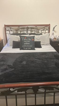 Queen sized sleigh bed w/ mattress and box spring $100