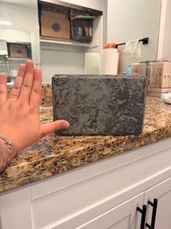 Black and grey marbled yoga block