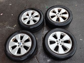 5x100 17 INCH STOCK WHEELS AND TIRES
