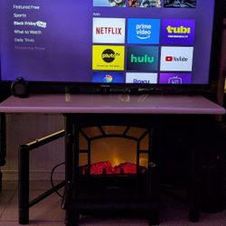  🎄 FOR SALE: 52” Toshiba TV with Chromecast Built-In – Excellent Condition 🎁 with TV Stand