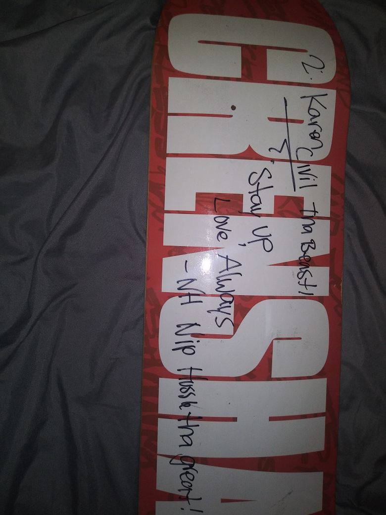 Crenshaw skateboard signed by nipsey hussle to karen civil