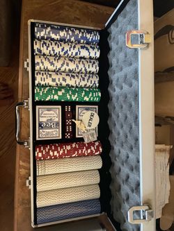 Four 500 Poker chips set and 25 chip racks