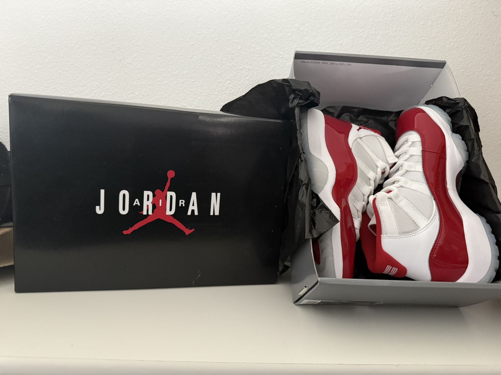 Size 4y Air Jordan11’s Retro. Red-white Deadstock