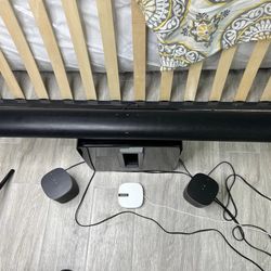 Sonos Arc S19 5.0 Channel Black Smart Soundbar, subwoofer and two rear speakers.