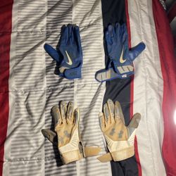 Blue Nike Baseball Gloves And Grey UnderArmor Baseball Gloves 