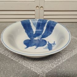 Blue and White Porcelain Bowl with Beets and Chile Peppers Inside .