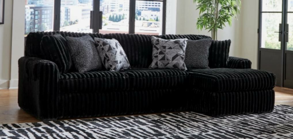 Black Sectional with Chaise and Pillows