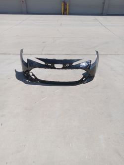 23 to 25 toyota corolla le xle front bumper  ( oem)