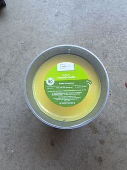 Outdoor citronella candle repels mosquitoes