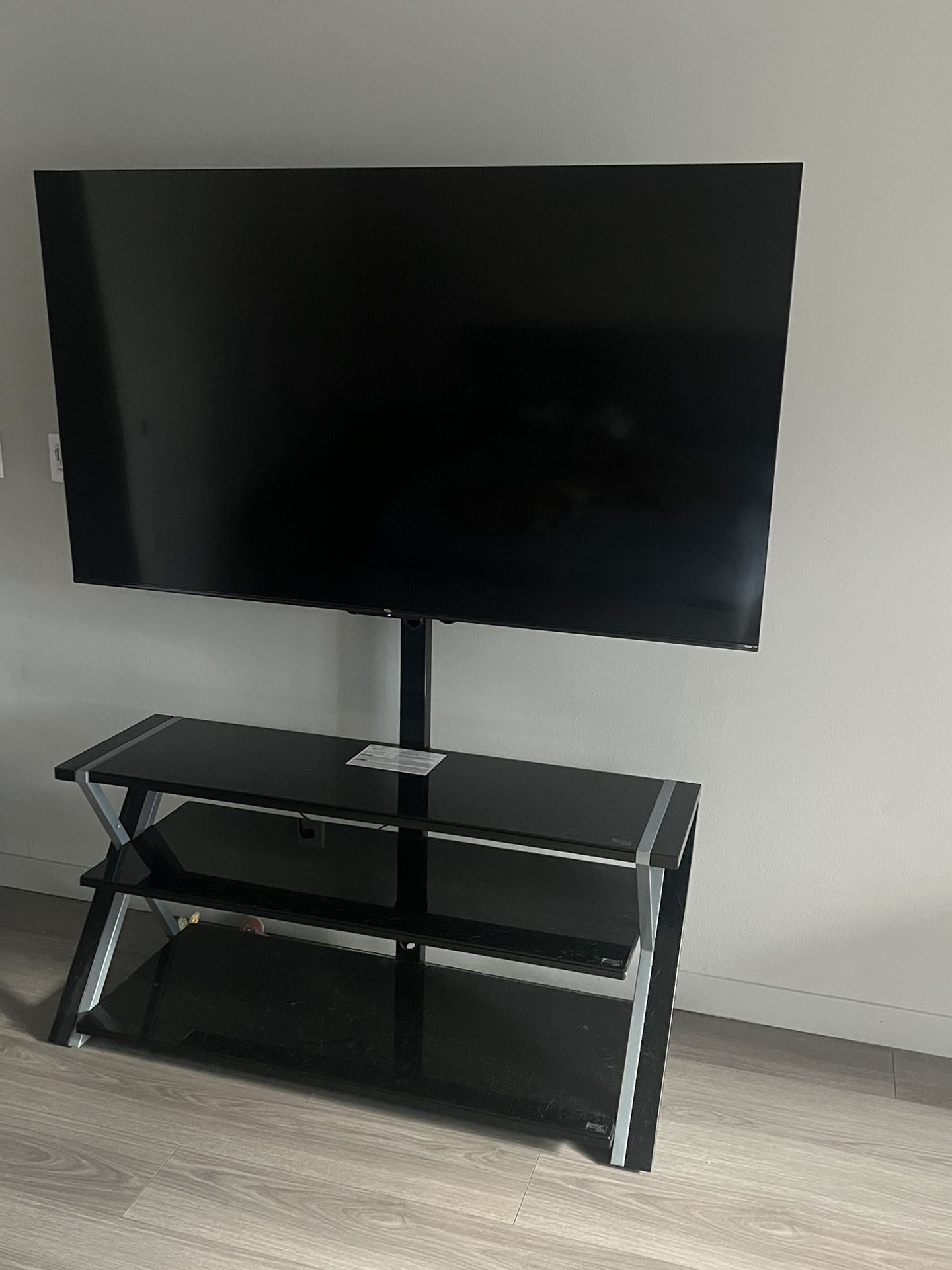 65 Inch TCL Roku Tv With Tv Stand 