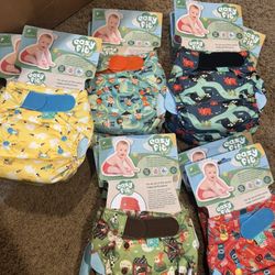 Numerous new Cloth Diapers, covers, and inserts.
