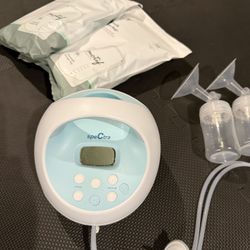 Spectra Breast Pump and accessories + milk storage bags