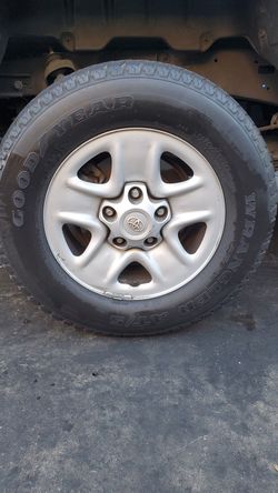 Toyota tundra rims and tires. Fits most 5 lug trucks
