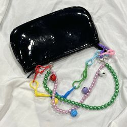 Black patent hobo bag with rainbow chains